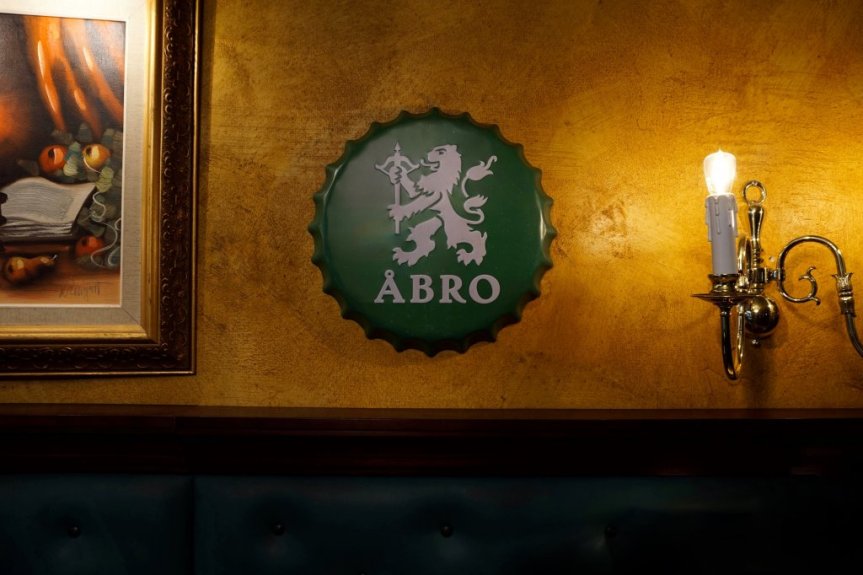 Väggskylt i metall Åbro