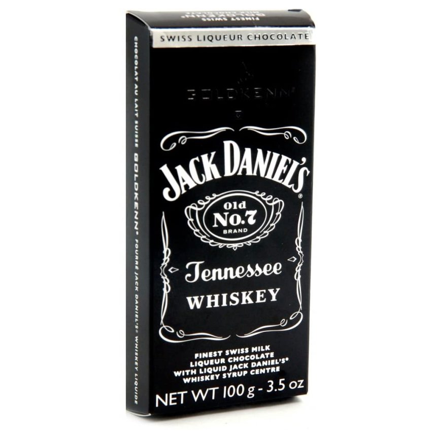 Julegavepakke med whiskyglass, sjokolade og pastiller